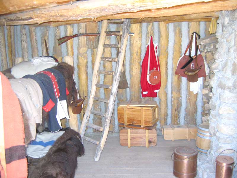 Sleeping quarters with additional sleeping space above