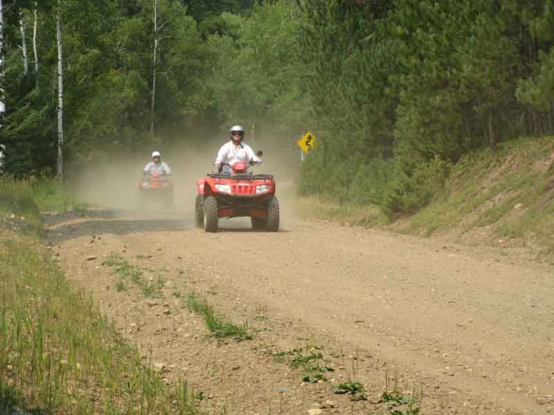 Anne and Ted on a dusty trail